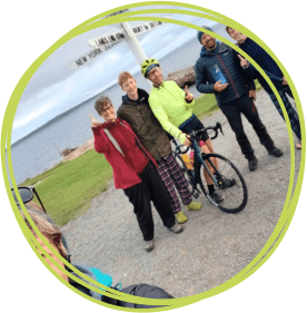 Jon and his support team at John O'Groats